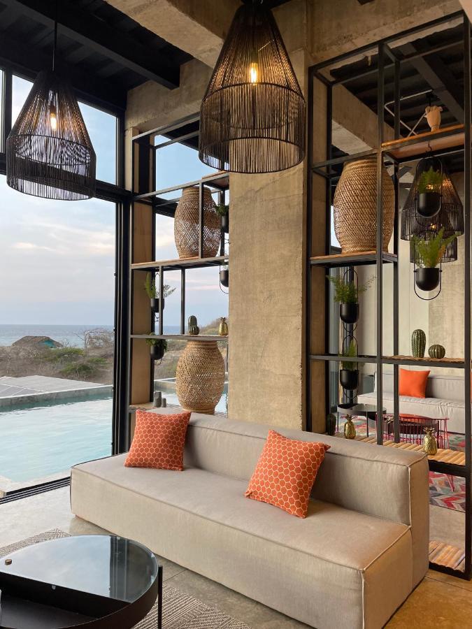 Eolia Sustainable Design Hotel Manta Bagian luar foto