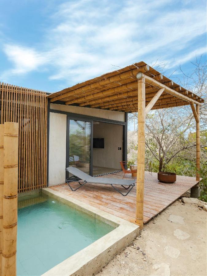 Eolia Sustainable Design Hotel Manta Bagian luar foto