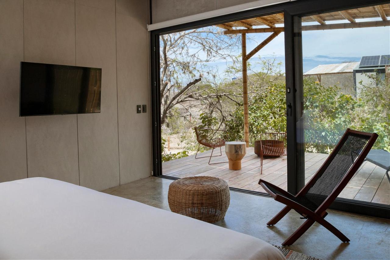 Eolia Sustainable Design Hotel Manta Bagian luar foto